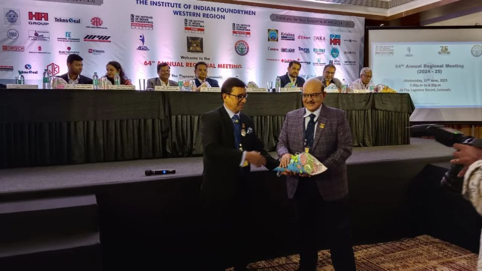 Bouquet presentation on stage during the Institute of Indian Foundrymen Western Region annual meeting in Lonavala