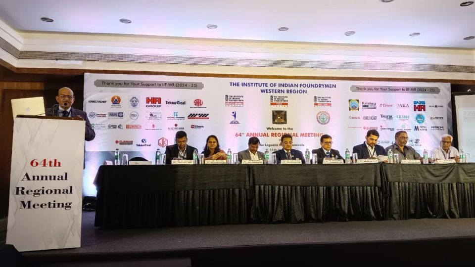 Head-table stage and branded backdrop at the Institute of Indian Foundrymen Western Region annual regional meeting